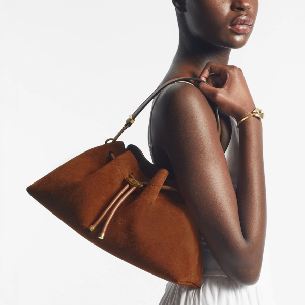 Jimmy Choo Cinch M Bag - where timeless style meets everyday luxury.